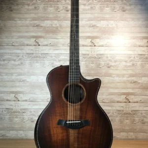 A work of art. Taylor K24CE Hawaiian Koa grand auditorium acoustic electric. Solid koa top, back and sides with silent satin finish over the most luxurious grains you can imagine. Beveled cutaway and armrest, Koa/Paua binding and rosette. Tropical mahogany neck, West African Crelicam Ebony fingerboard. Taylor expression 2 pickup system. Dead mint condition, no signs of use, and certainly no damage. Includes Taylor deluxe hardshell case. (Consignment) Full manufacturer info